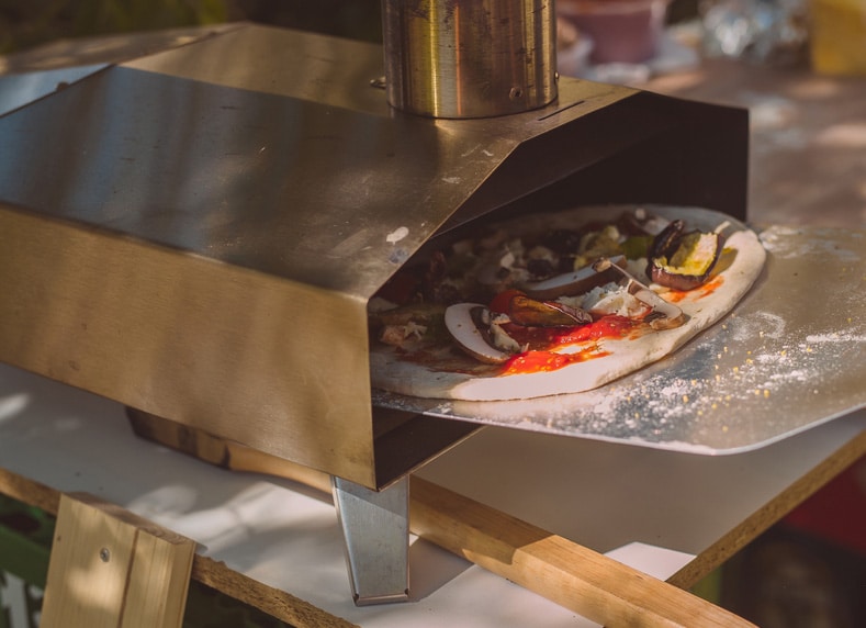 How To Use a Pizza Peel: 5 Tips From a Pro - Pala Pizza Ovens