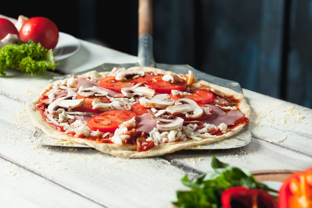 How To Use a Pizza Peel: 5 Tips From a Pro - Pala Pizza Ovens