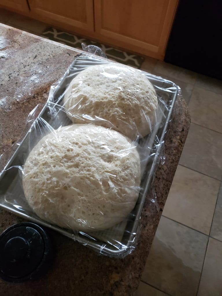 How Long Can Pizza Dough Sit Out Before Cooking?
