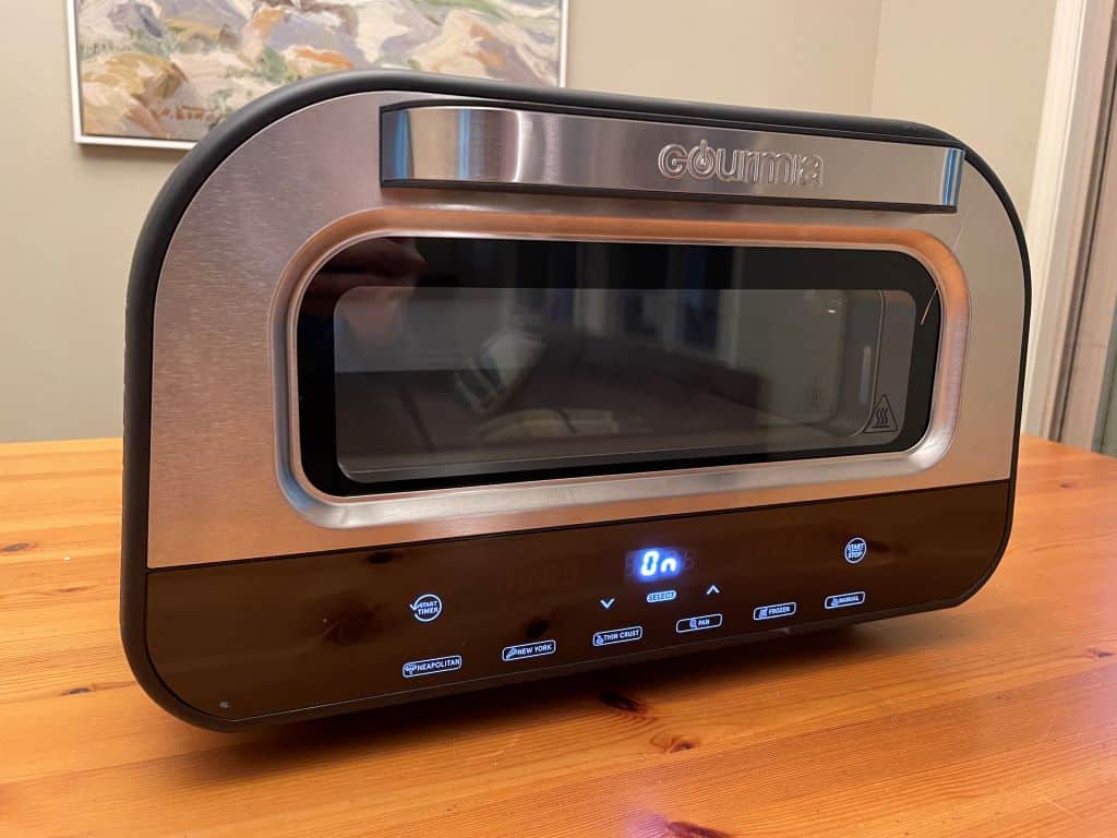 The Gourmia Pizzeria Indoor Pizza Oven on a table