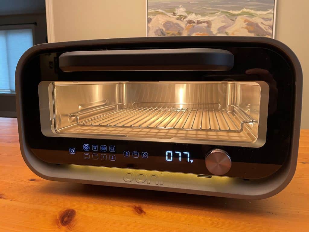 Ooni Volt 2 Review: A Premium Electric Pizza Oven Gets Even Better? Pizza Oven Picture of the Volt 2 showing the updated buttons and single dial controls.