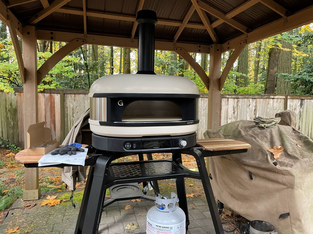 Gozney Dome Gen 2 Review - Gozney's Biggest Oven Gets Even Bigger Pizza Oven Fully assembled Dome Gen 2 sitting outside under a gazebo
