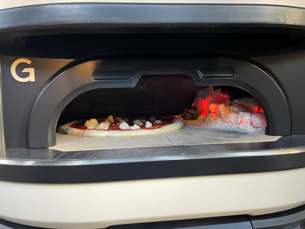 Gozney Dome Gen 2 Review - Gozney's Biggest Oven Gets Even Bigger Pizza Oven Pizza cooking with binchotan charcoal in the Gozney Dome 2